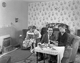 Typical working class living room scene with family, 11 July 1962. Artist: Michael Walters