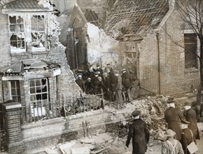 House damaged by a crashed RAF aircraft, Leytonstone, London, World War II, 11 February 1942. Artist: Unknown