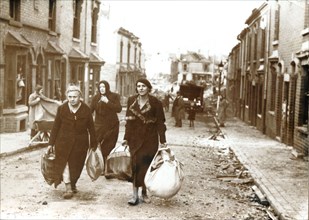Women collect their belongings from bombed houses, London, World War II, c1940-c1945. Artist: Unknown