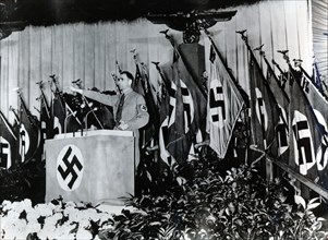 Rudolf Hess, Nazi deputy leader, speaking at the Sportpalast, Berlin, 1939. Artist: Unknown
