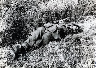 A German soldier killed during the invasion of Normandy, 1944. Artist: Unknown