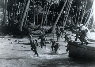 Japanese troops land on an island in the Pacific, World War II, c1941-c1942. Artist: Unknown