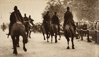 Police on Horseback controling crowds during the Great Strike at Hyde Park Corner, pub. 1926 (photog