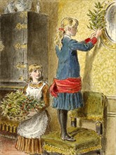 Decorating for Christmas, pub. 1854. Creator: Alfred W Cooper (1850 - 1901).