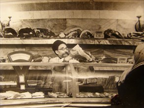 Meat counter in a Soviet food store, USSR, 1960s. Artist: Anon