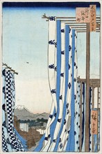 The Dyers' District in Kanda (One Hundred Famous Views of Edo), 1856-1858.  Creator: Hiroshige, Utagawa (1797-1858).