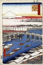 Clearing Weather after Snow at Nihon Bridge, (One Hundred Famous Views of Edo), 1856-1858. Creator: Hiroshige, Utagawa (1797-1858).
