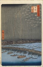 Fireworks by Ryogoku Bridge (One Hundred Famous Views of Edo), 1856-1858. Artist: Hiroshige, Utagawa (1797-1858)