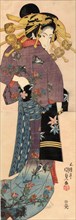 A Standing Bijin, ca 1820. Artist: Kunisada (Toyokuni III), Utagawa (1786-1865)