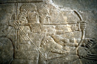 King Ashurnasirpal II during a royal lion hunt, 650-620 BC. Artist: Assyrian Art
