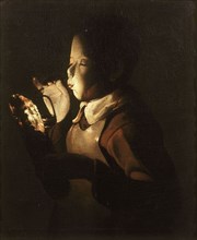Boy Blowing at Lamp. Artist: La Tour, Georges, de (1583-1652)