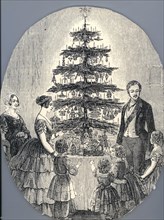 Christmas with Queen Victoria, Prince Albert, their children and Queen Victoria's mother, in 1848 (f Artist: Anonymous