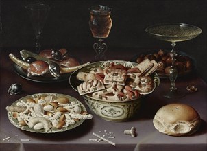 Still life with sweets, chestnuts and a bread roll. Artist: Beert, Osias, the Elder (ca. 1580-1624)
