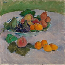 Still life with fruit and leaves.