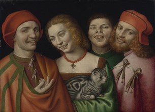 Three men with a woman holding a cat.