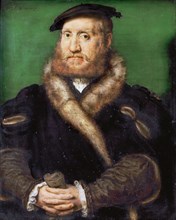 Portrait of a bearded man with fur coat.