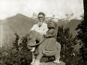 Nicholas Roerich by the equestrian statue of Guga Chauhan at the Kullu Valley, 1932-1933.