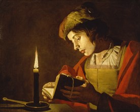A Young Man Reading by Candlelight, c.1630.