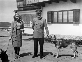 Eva Braun and Adolf Hitler, with their two dogs Wulf and Blondi at the Berghof, 1942.