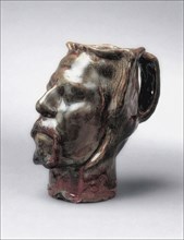 Jug in the Form of a Head. Self-portrait, 1889.