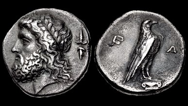 The 107th Olympiad. Obverse: Head of Zeus, Reverse: Eagle. Elis, Olympia, 352 BC.