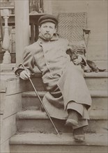 Anton Chekhov (1860-1904) with dog Hina. Melikhovo, 1897.