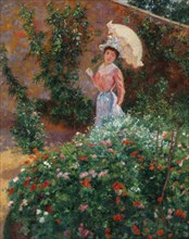 Young woman in a garden, c. 1890.