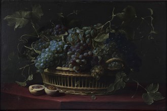 Still life with a basket of grapes.