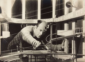 El Lissitzky Working on a Stage Design, Meyerhold Theatre, 1929. Creator: Anonymous.