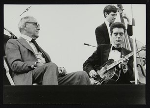 Benny Goodman watching Phil Flanigan and Chris Flory, Knebworth, Hertfordshire, 1982. Artist: Denis Williams