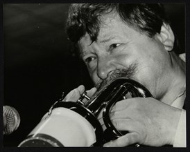Trumpeter Janusz Carmello performing at The Fairway, Welwyn Garden City, Hertfordshire, 1991. Artist: Denis Williams