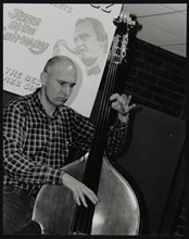 Bassist Simon Woolf playing at The Fairway, Welwyn Garden City, Hertfordshire, 2002. Artist: Denis Williams