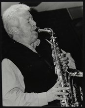 Geoff Simkins playing alto saxophone at The Fairway, Welwyn Garden City, Hertfordshire, 2002. Artist: Denis Williams