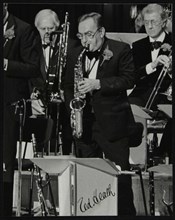 Ted Heath Orchestra alto saxophonist Ronnie Chamberlain playing at the Barbican Hall, London, 1985. Artist: Denis Williams