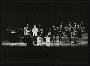 The Ted Heath Orchestra in concert at the Barbican Hall, London, December 1985. Artist: Denis Williams