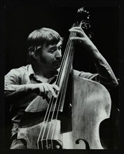 Double bassist Ron Mathewson playing at the Forum Theatre, Hatfield, Hertfordshire, 23 January 1982. Artist: Denis Williams