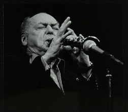 Woody Herman playing his clarinet at the Forum Theatre, Hatfield, Hertfordshire, 24 May 1983. Artist: Denis Williams