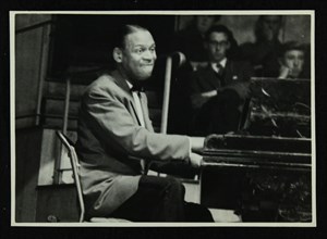 Earl 'Fatha' Hines at the piano, 1950s. Artist: Denis Williams