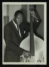 Portrait of American double bass player Curtis Counce, c1950s. Artist: Denis Williams