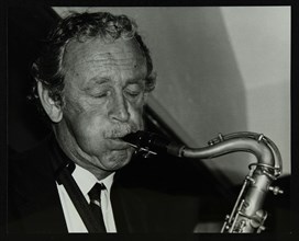 Spike Robinson playing the tenor saxophone at The Bell, Codicote, Hertfordshire, 11 September 1986. Artist: Denis Williams