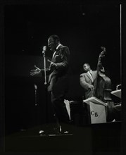 The Count Basie Orchestra in concert at Colston Hall, Bristol, 1957. Artist: Denis Williams