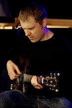 Stuart McCallum, Watermill Jazz Club, Dorking, Surrey, 4th October 2016. Artist: Brian O'Connor.