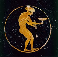 Athenian red-figure cup with naked girl with cup and ladle inside, 520 BC. Artist: Oltos.