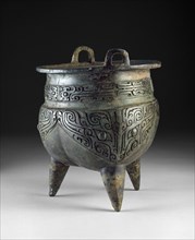 Ritual food vessel, or li ding, with taotie masks, Shang Dynasty, Erligang Period (c1500-c1300 BC). Artist: Unknown.