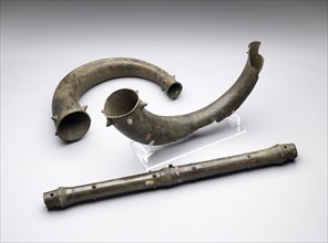 Trumpets and trumpet tube, Bronze Age (Britain), (c2500 BC-c800 BC). Artist: Unknown.
