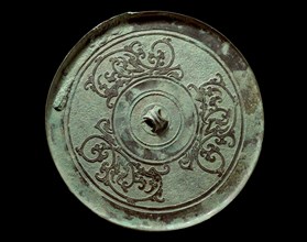 Ritual mirror with interlaced dragons on a geometric ground, 2nd century BC. Artist: Unknown.
