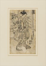 Woodblock print - Onoe Kikingoro I as a woman reading a book, 18th century Artist: Okumura Masanobu.