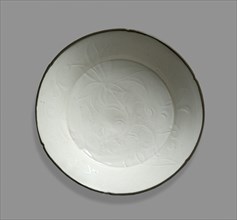 White ware dish with lotus decoration, 12th century Artist: Unknown.