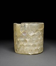 Glass beaker with circular facets, Sasanian Period, 226-651. Artist: Unknown.