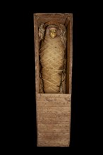 Ptolemaic coffin, mummy with gilt mask and floral garlands, Roman Period (Egypt), c30BC-AD641. Artist: Unknown.